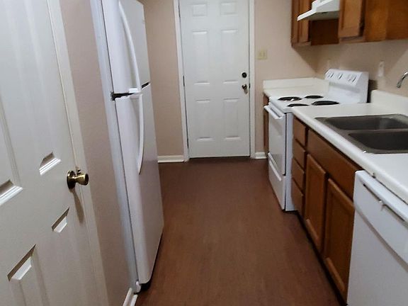 Galley Kitchen includes, Electric range, refrigerator and dishwasher