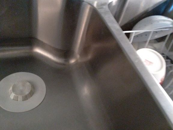 My kitchen has a double sink that is tremendously deep which is wonderful you can wash your baby in there or your kitty or your dishes