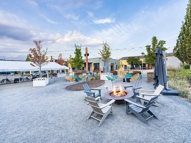 A laid-back outdoor hangout at Westside Motor Lounge, just minutes from Modera Westside Trail_perfect for casual gatherings around the fire.