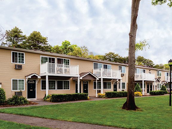 Elegant Exterior Building View at Lakeside Village, East Patchogue