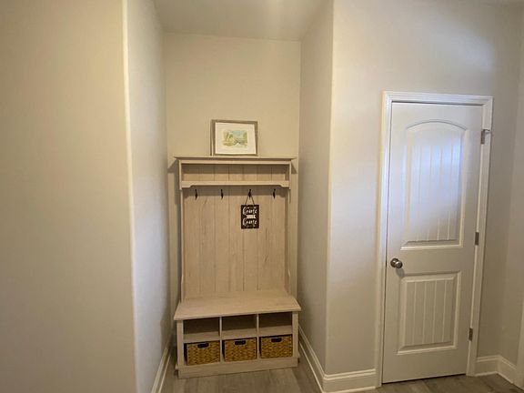 Coat closet with set-back nook