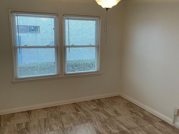 Bedroom with ceiling fan.