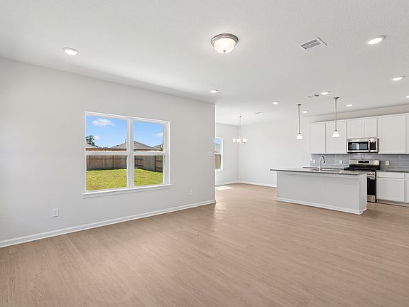 The Oriole II- Family Room into Kitchen