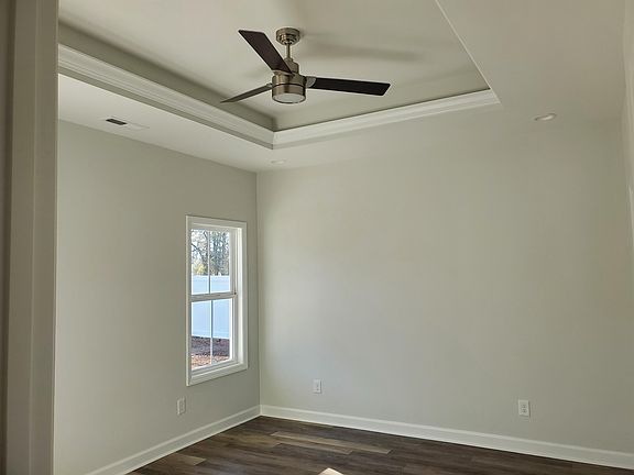 Master bedroom with tray ceiling