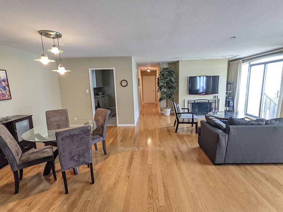 Living Room (showing kitchen and hallway to bedrooms)