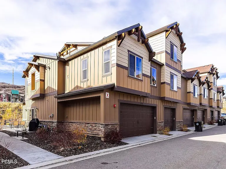 End unit with convenient attached two car garage and patio.