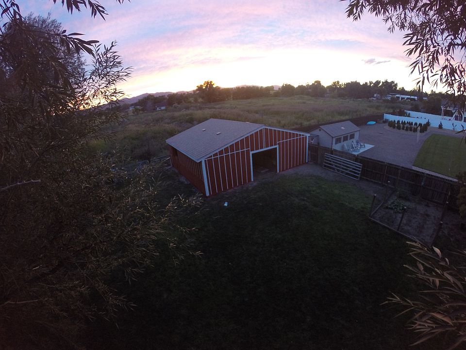 Sun setting over the barn