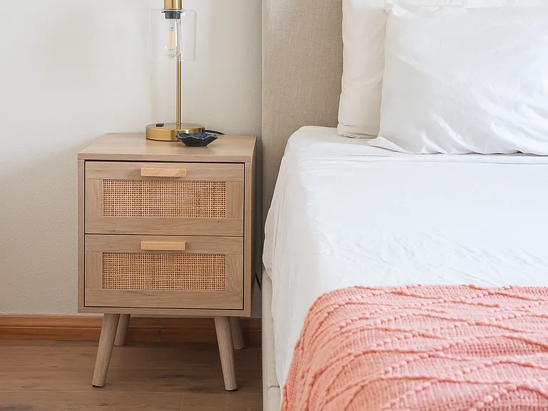 Nightstand and lamps in downstairs bedroom