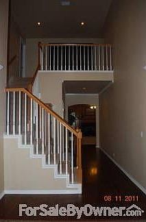 Two-story entryway : Two-story entryway has office and dining room on either side