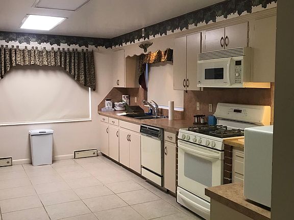 Kitchen with gas appliances.