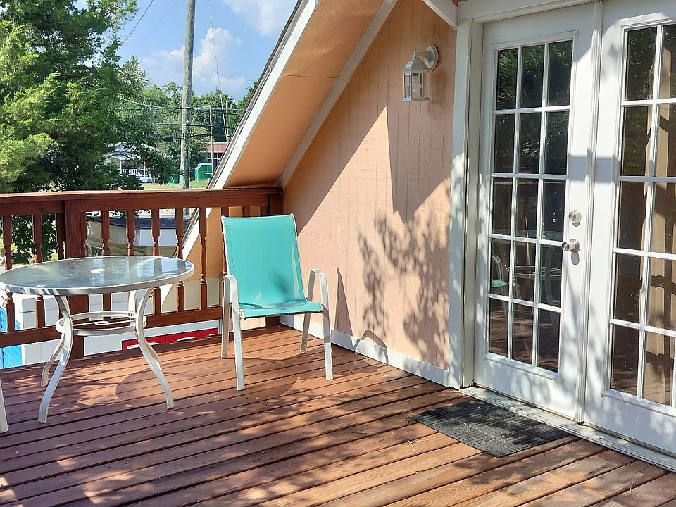 Large patio has double French doors opening into the living room. Have morning coffee on the patio and feel like you're in a treehouse.