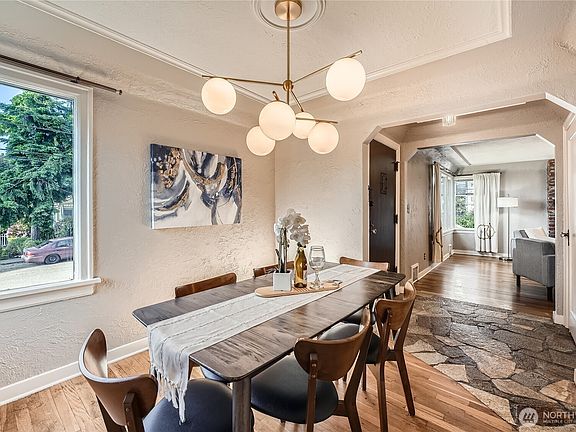 Dining Room is open to the dedicated Entry which creates a visual connection to the Living Room.>
