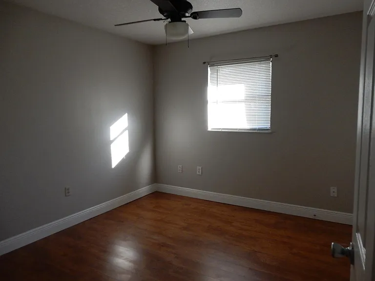 3rd bedroom with wood floors