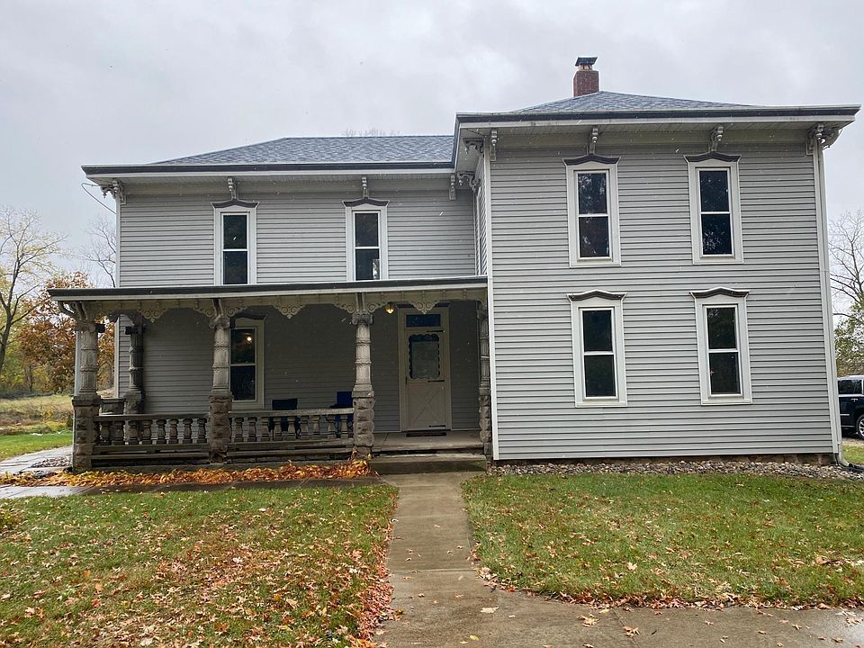 Front of house with large porch