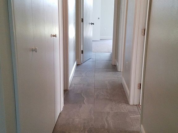 Tiled Hall with 9ft ceilings in unit