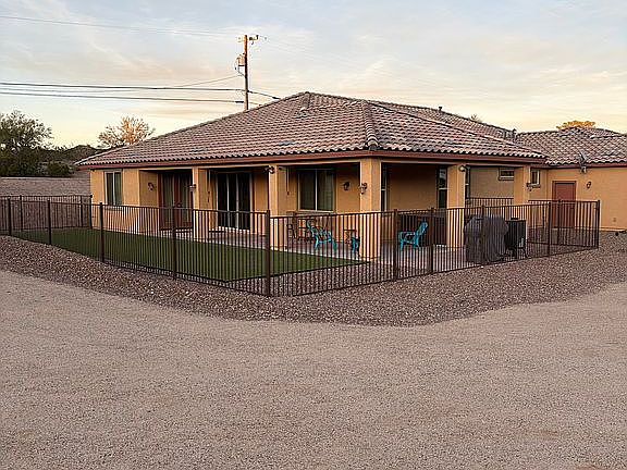 Rear wrapped porch & hot tub
