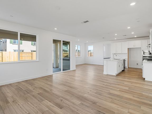 Gathering room open to kitchen and cafe area