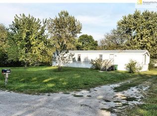 307 S Franklin Dr, Raymore, MO 64083