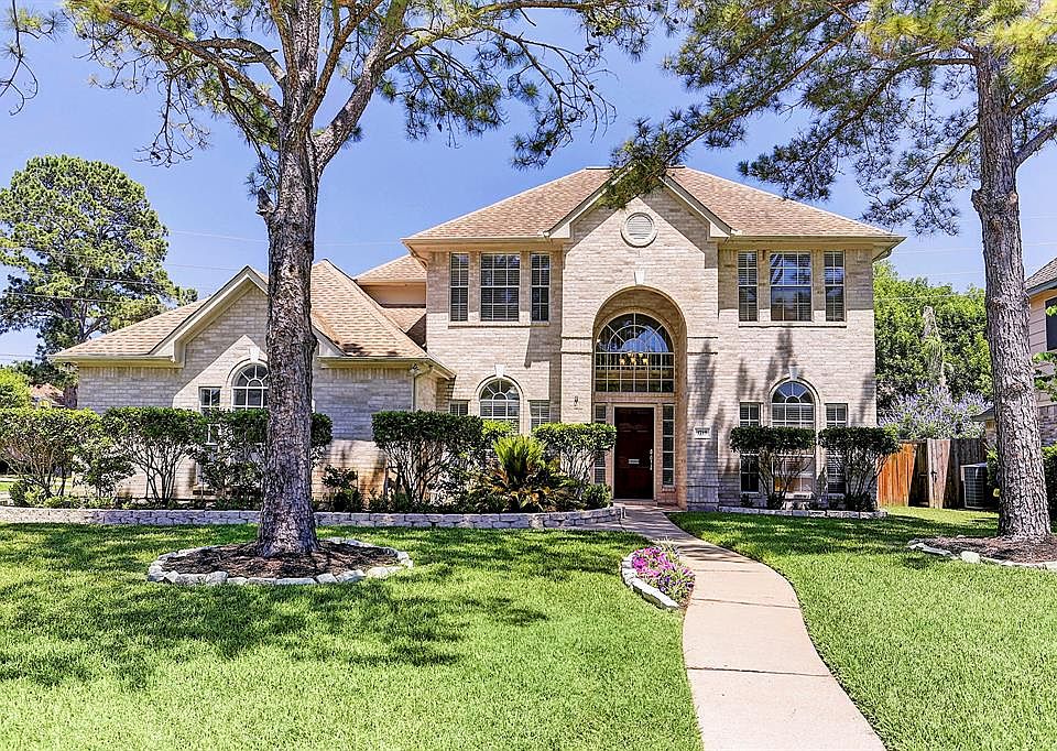 Located on a corner lot on a quiet tree-lined street is this wonderfully updated home!