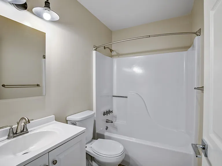 Enhance your lifestyle at Waterfront at the Strand, where modern design meets comfort. This stylish bathroom features contemporary fixtures and ample space for your convenience. Explore your new home today and schedule a tour!