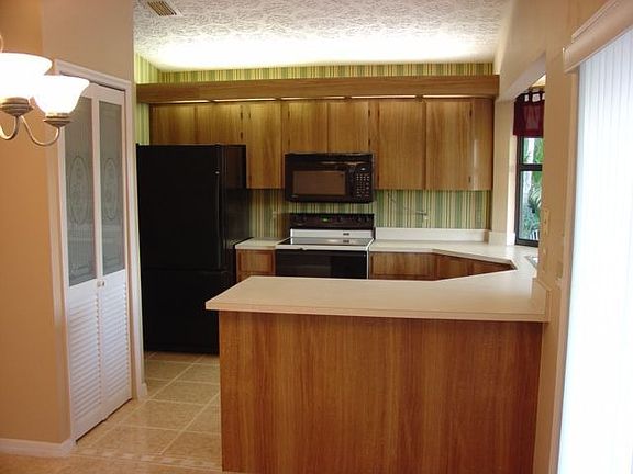 kitchen with bay window and pass thru to patio