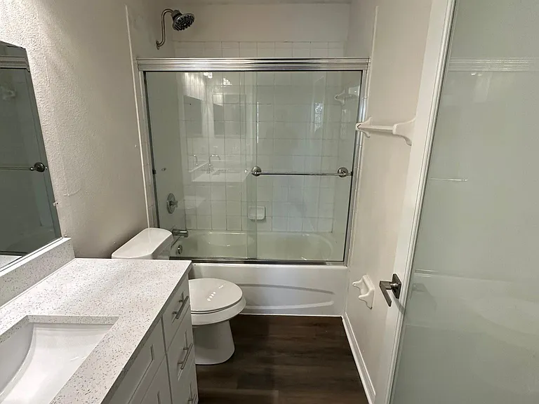 Master bath, quartz counters and modern Moen fixtures
