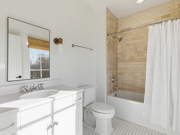 Full bathroom 3 is connected to bedroom 3 with a shower/tub combo.