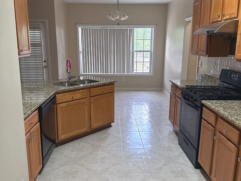 kitchen, stove and dishwasher included