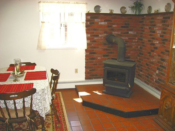 wood stove, quarry tile floor