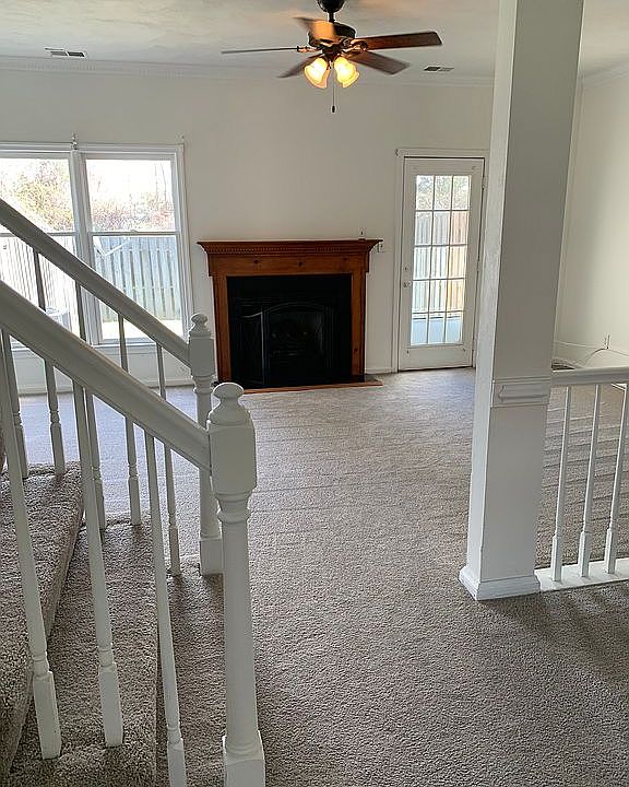 Den with gas fireplace