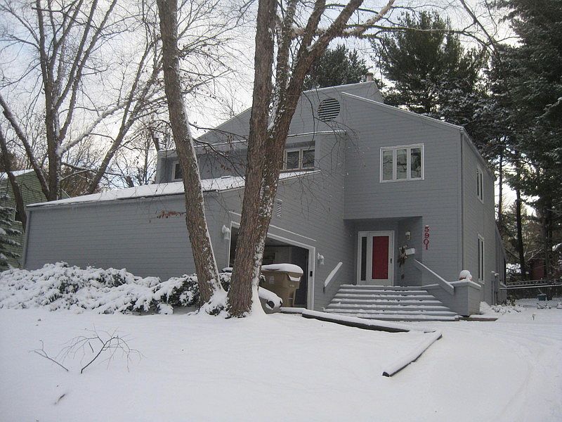 Front of house : View from sidewalk Park is directly in front of house