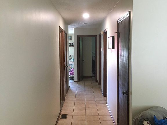 hallway with coat closet
