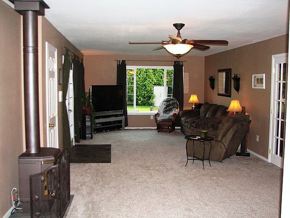 HUGE brand new family room with gas stove on a thermostat