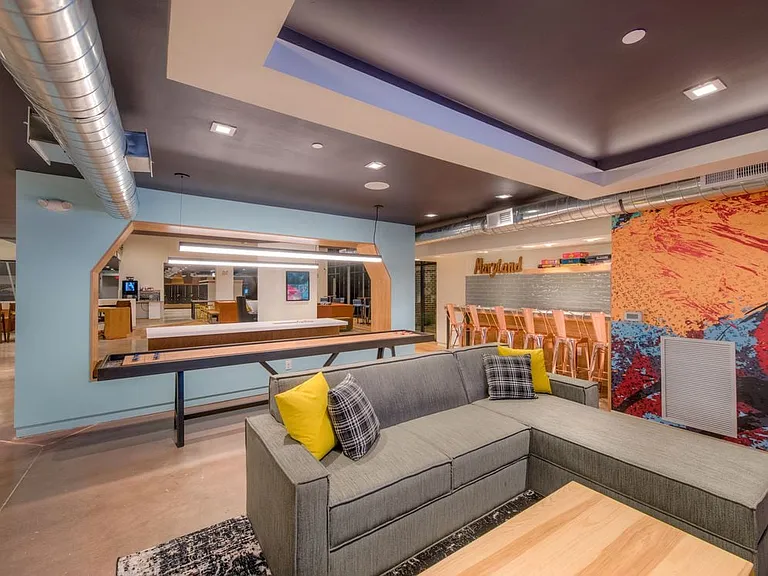 Chill lounge with shuffleboard and common area seating