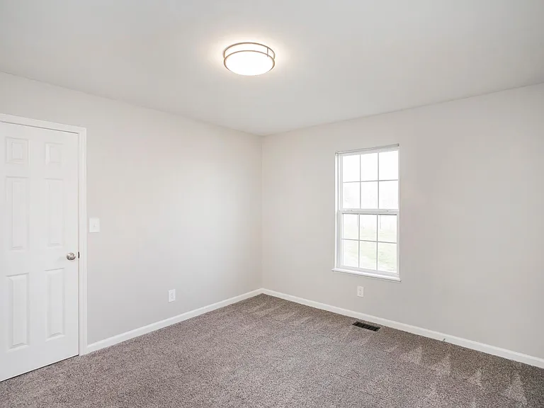 Secondary back bedroom with large walk in closet