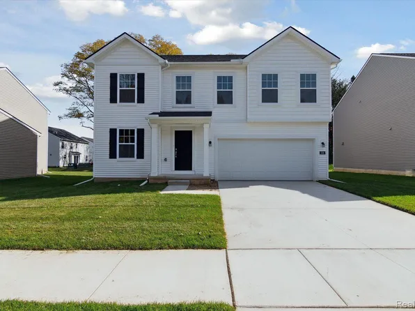 588 Heritage Farms Blvd, Chelsea, MI 48118