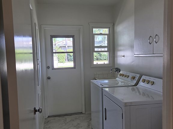 Laundry/utility room at back door.
