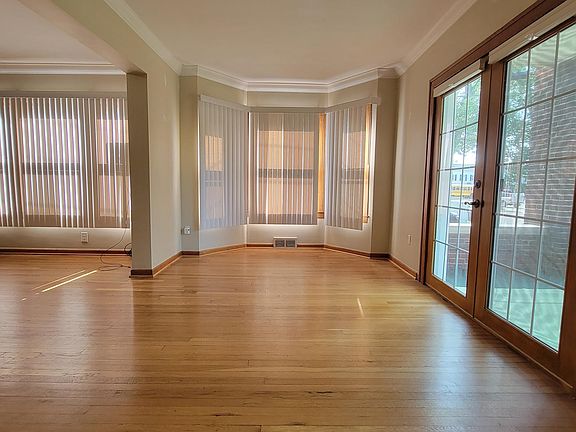 Spacious interior with hardwood floors