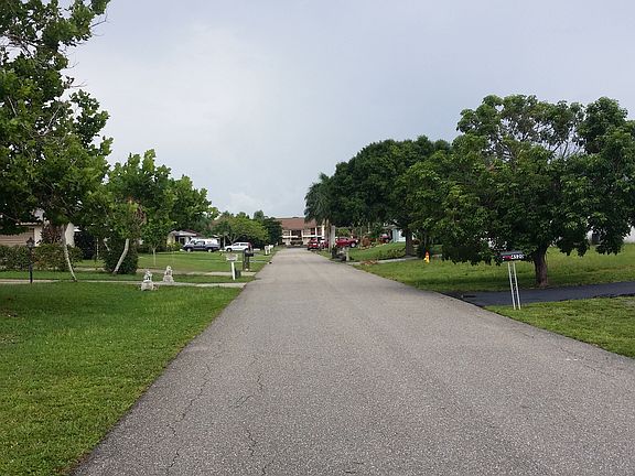 Looking to the left down street standing infront of home