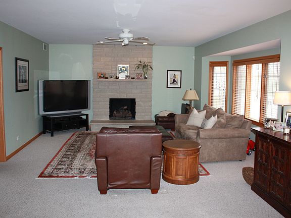 Family room with stone fireplace