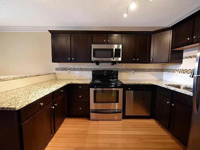 Experience culinary excellence with this elegantly designed kitchen space.