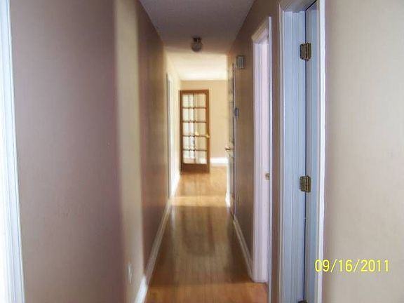 Hallway with hardwd floor