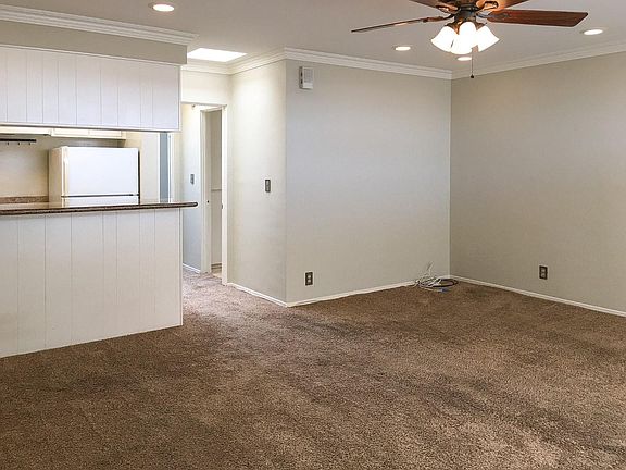 Living Room towards Kitchen, Bathroom, and Bedroom