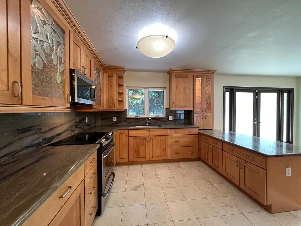 kitchen, custom cabinets, granite countertops, stainless steel GE appliances