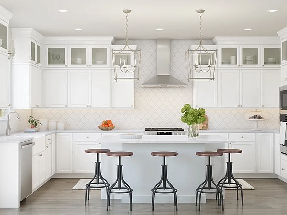 Kitchen with pendant lighting and glass upper cabinets