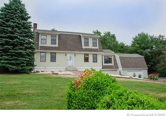 FRONT OF HOME SHOWING DETAC...