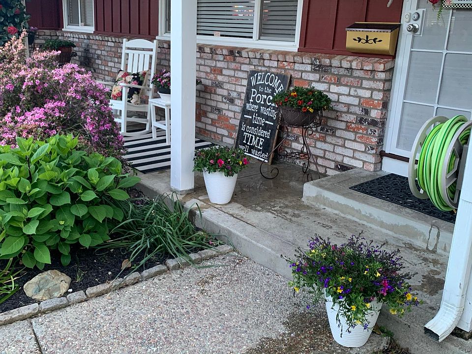 Front Porch with Sweet Rocking Chairs to enjoy morning coffee or an evening cocktail?