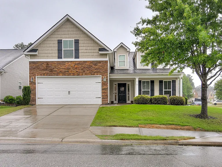 Front View of House on corner lot.