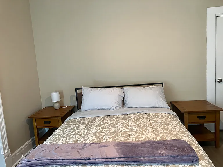 Large, fully furnished second bedroom with a new queen-size bed with a hybrid mattress