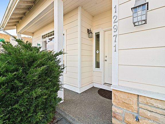 Front entry with covered porch. Welcome home!